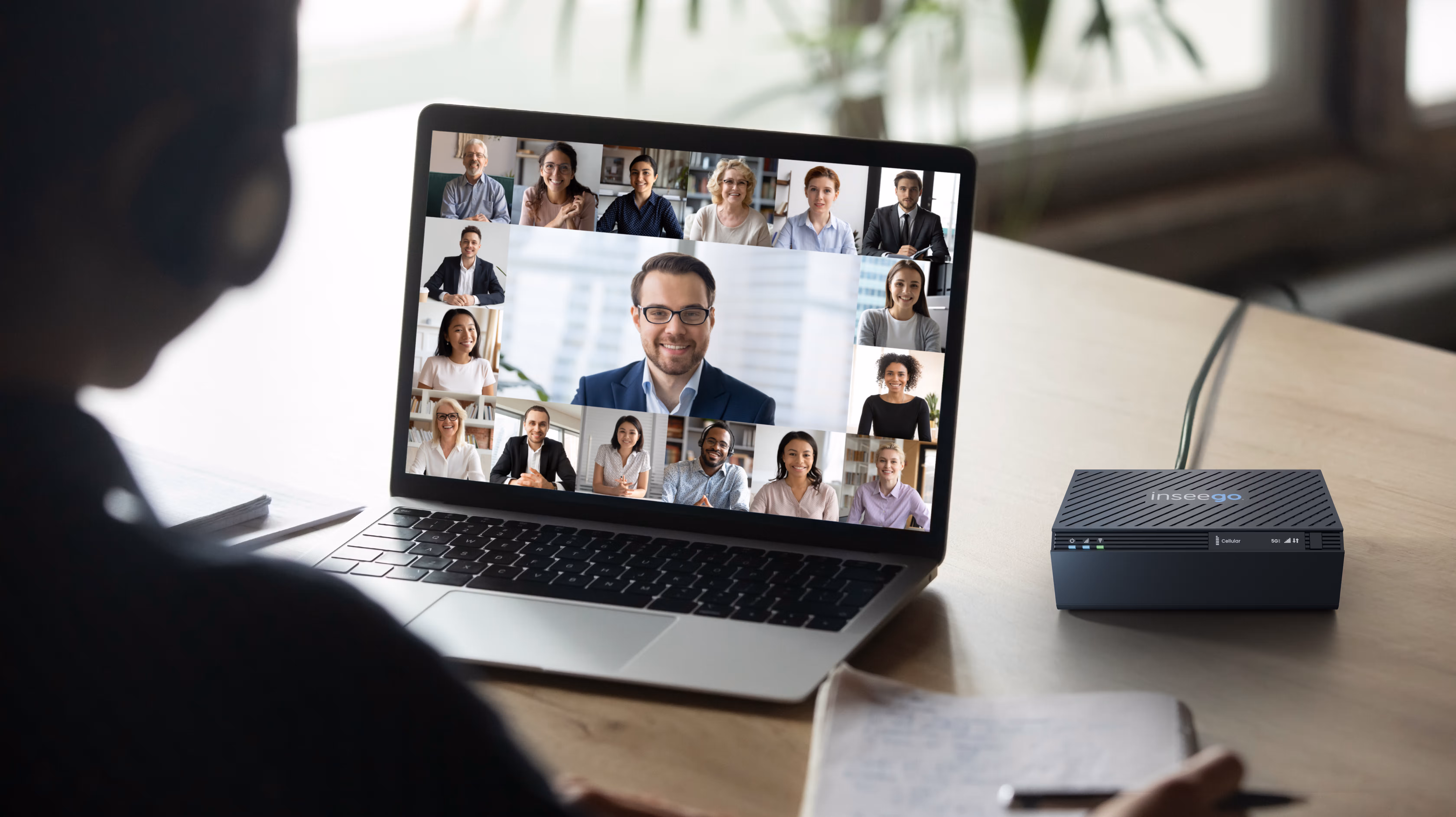 An employee using the FX4100 to get connectivity for a meeting.